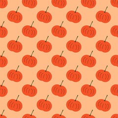 Seamless geometric pattern with orange pumpkin on light pink background. Vector print for fabric background