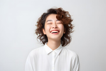 Fototapeta premium Portrait of young beautiful smiling woman isolated on white background