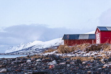 red barn in the mountains