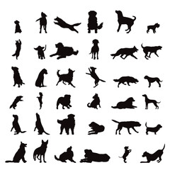Set of vector silhouettes of different dogs on white background.