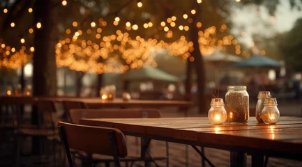 Fotobehang local dining scene of a restaurant in the evening with string lights © Kien