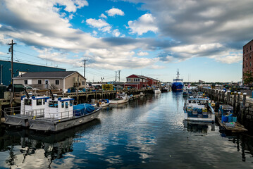 Fototapeta na wymiar docks and boats at docks in Portland Maine, USA