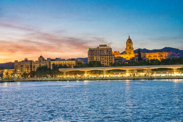 Malaga sunset skyline form the city port