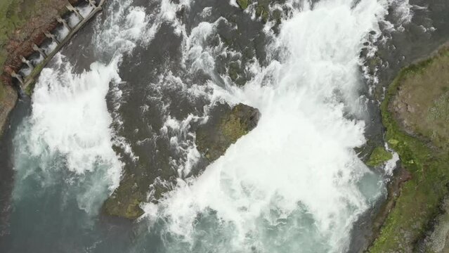 Steadicam aerial video of the Burra River with the Brouarfoss waterfall, Iceland