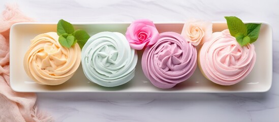 Cotton wool Thai cupcakes also known as Pui Fai are a traditional airy dessert photographed against isolated pastel background Copy space