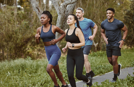 Runner group, men and women in park, training and outdoor exercise for health, sport or performance. Teamwork, running and workout for fitness, wellness and diversity in summer, freedom or nature