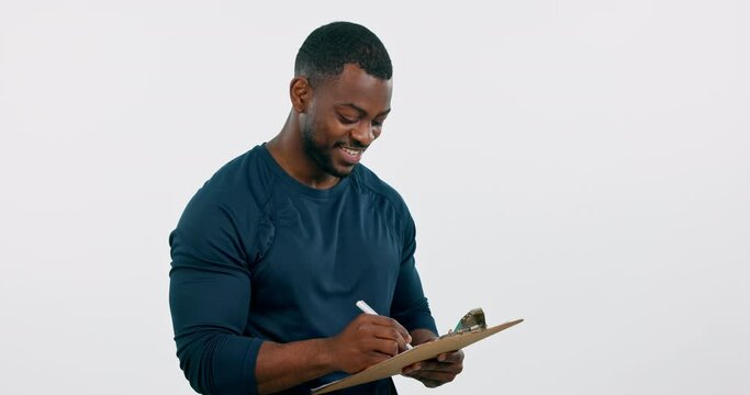 Smile, come and join us with a happy black man in studio on a gray background for membership recruitment. Portrait, documents and writing with a confident young person pointing at you for choice