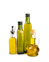 Obraz na płótnie Canvas Olive oil in a bottle isolated on white background. Oil bottle with branches and fruits of olives. Place for text. copy space. cooking oil and salad dressing.
