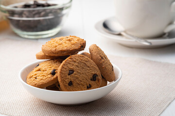 Pile of Chocolate Chip Cookies on a White Plate