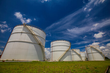 Tank farm in industry Thailand with white oil and petrol silos