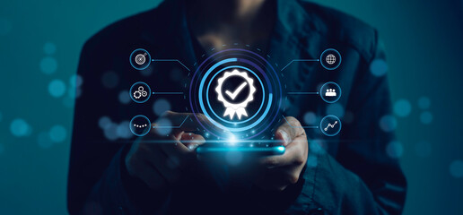 Businessman used smartphone show Certification Quality Assurance Guarantee. ISO certificate and...