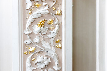 Classic luxury interior details, white vine and golden grapes