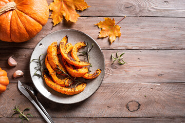 Grilled pumpkin slices with garlic and herbs