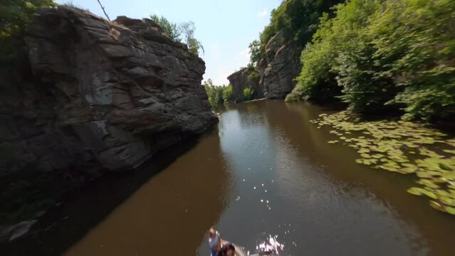 FPV, Ukrainian canyon in the village of Buki, Amazing aerial view of Buky canyon on a sunny day. Buka canyon on the Girsky Tikich river, Cherkasy region, Ukraine. Concept, travel, outdoor recreation, 