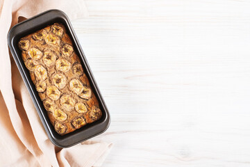 Delicious freshly baked homemade banana bread cake with no gluten and sugar free, top view on white...