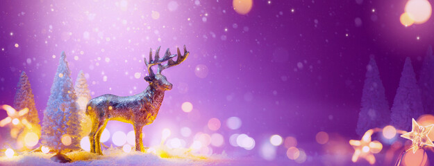 Christmas greeting card or banner design with santas reindeer and snowy tree decoration  Copy space © Konstiantyn