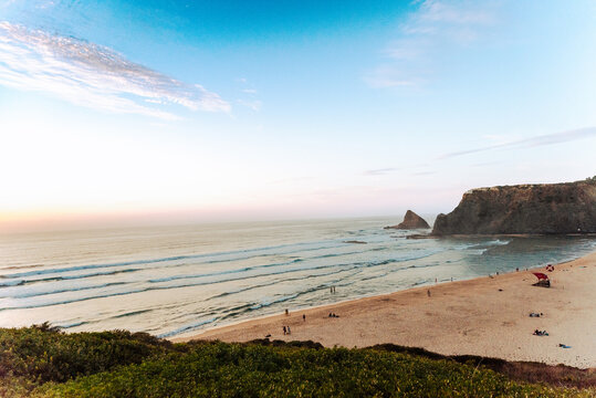 Odeceixe Beach, Aljezur, Portugal, mesmerizing sunset. Nature's beauty captured at its finest. Ideal for travel and relaxation projects - high quality