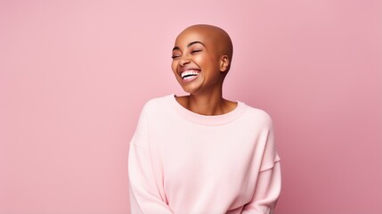 Warm-toned waist up portrait of carefree bald woman smiling while posing against minimal pink background in studio, alopecia and cancer awareness, copy space - obrazy, fototapety, plakaty