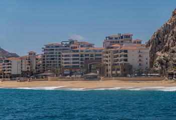 Mexico, Cabo San Lucas - July 16, 2023: Grand Solmar lands end resort and spa building behind sandy...