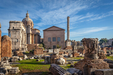 Roman ruins with Curia, Rostra and Triumphal Arch of Septimius Severus on the Roman Forum in Rome,...