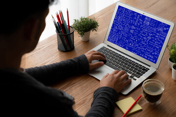 Mathematic equations and modish formula on computer screen showing concept of science and education