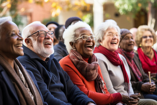 Group of happy diverse senior people sitting together. National Grandparents Day, International Day of Older Persons