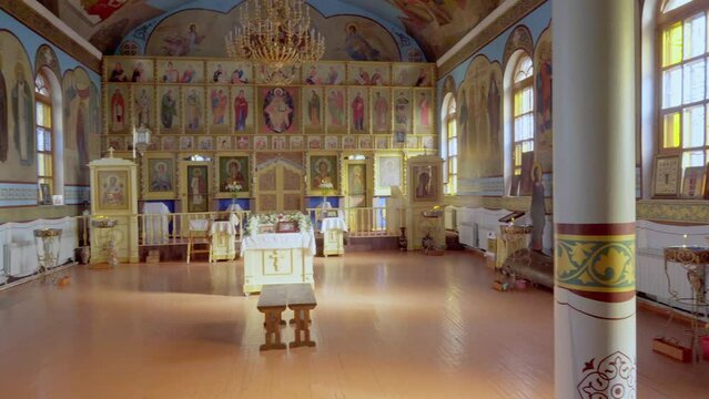 SHYMKENT, KAZAKHSTAN - JANUARY 24, 2023: Panorama of the interior of the temple in honor of the icon of the Mother of God of Kazan, Kazakhstan