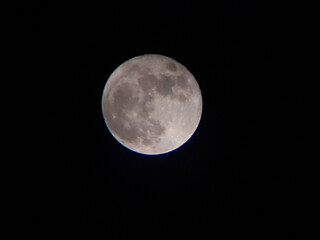 Super full blue moon in Indonesia shot on september 2023, isolated on dark background