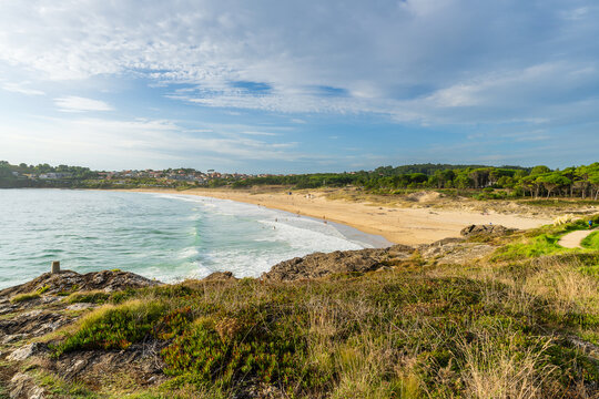 At the end, Montalvo Beach in the municipality of Sanxenxo in the province of Pontevedra, in Galicia, Spain.