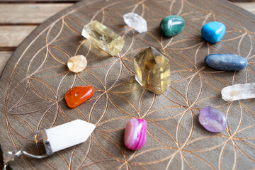Healing crystals on brown background