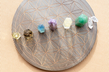 Healing crystals on brown background