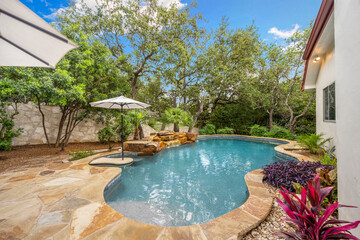 a home pool with trees