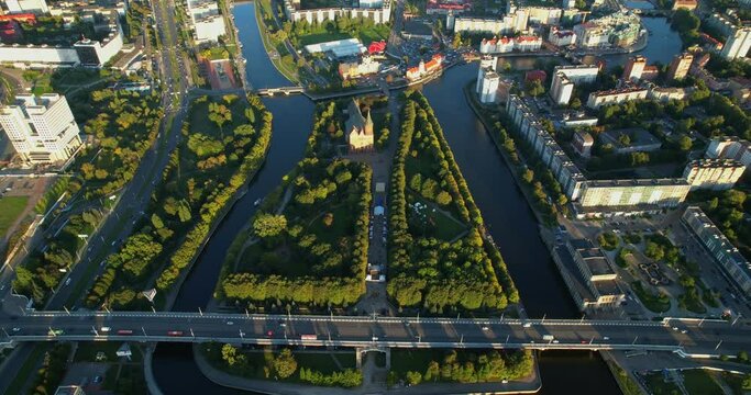Kaliningrad city aerial shot. Immanuel Kant Island Cathedral. Konigsberg at sunset, drone view. Pregolya River.