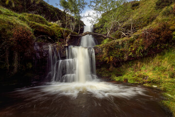 One of a series of waterfalls that roll down the mountains in the Brecon Beacons in South Wales UK
