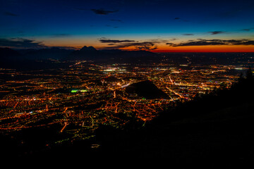 Night view from Gaisberg hill over Salzburg city in summer hot evening