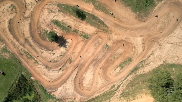 Top view of riders on the motocross track.