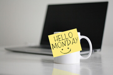 Hello Monday is shown using the text and photo of coffee cup