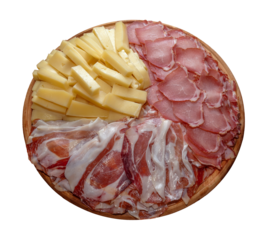 Charcuterie and cheese board in top view. Slices of ham and salami with pieces of cheese on wooden cutting board isolated