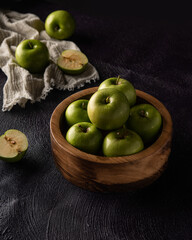Wooden dishes for nuts and fruits in the dark
