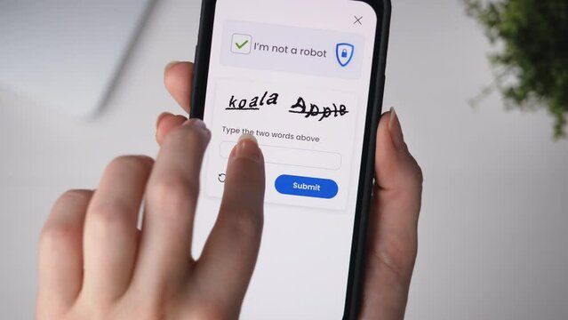 Completing CAPTCHA verification on a smartphone. Proving not to be a bot.