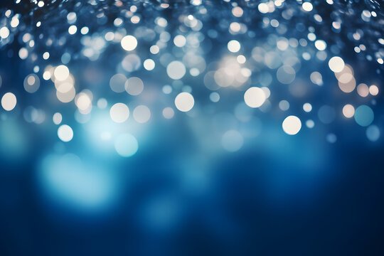 Blurred bokeh lights on a dark blue backdrop