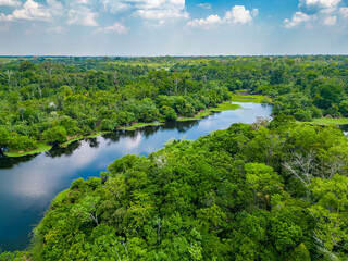 Scenic aerial sunset view of rainforest river in Amazonas Brazil - obrazy, fototapety, plakaty