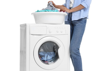 Woman with laundry basket and washing machine on white background, closeup