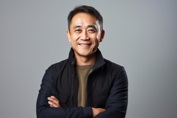 Group portrait photography of a Vietnamese man in his 40s against a white background