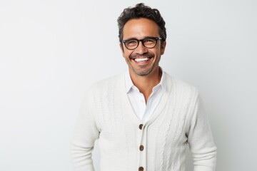 Lifestyle portrait photography of a Peruvian man in his 40s against a white background