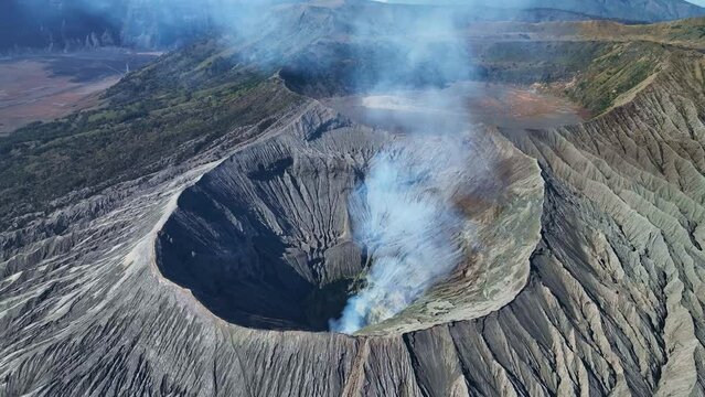 Aerial view of Amazing Mount Bromo volcano during sunrise from king kong viewpoint on Mountain Penanjakan in Bromo Tengger Semeru National Park,East Java,Indonesia.Nature landscape background