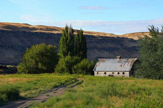 An old barn in a mountain valley