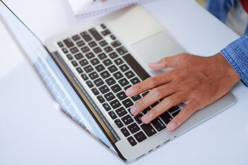 Man Typing on Laptop Keyboard, Creative Blog Writing Concept
