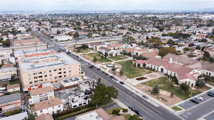South Gate, California, USA - February 11, 2023: Traffic passes through the urban core of South...