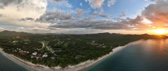Playa Conchal, nestled in Guanacaste, Costa Rica, boasts pristine white seashells and turquoise waters, making it a tropical paradise for beach lovers.